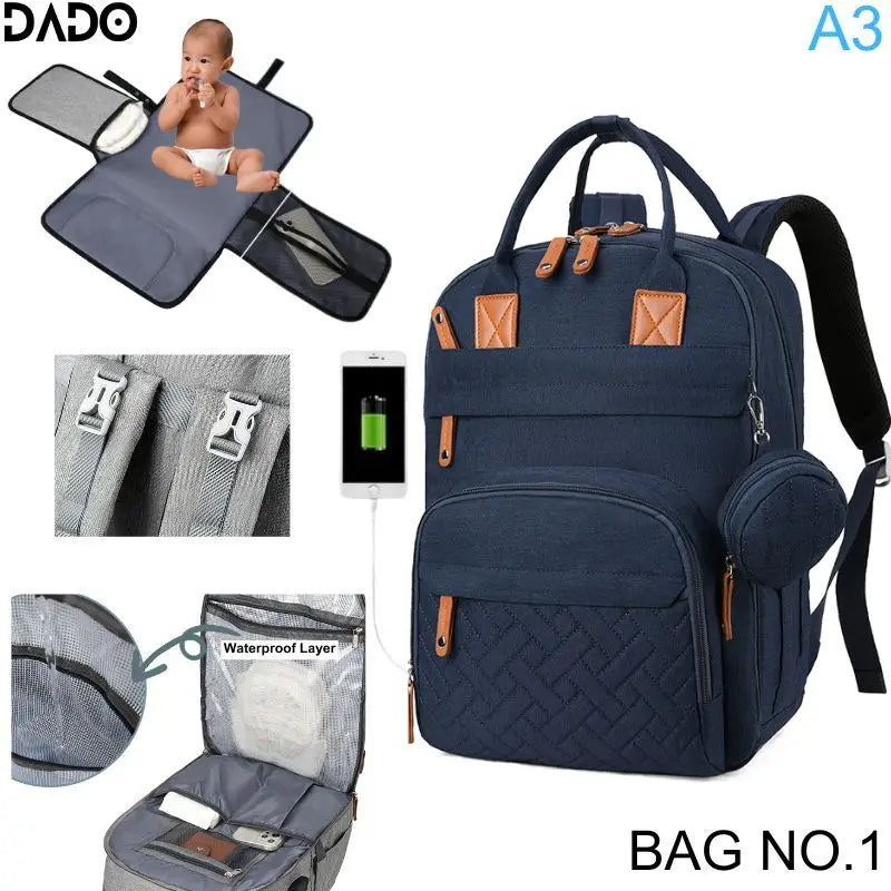 Sac à dos langer DADO bleu foncé – fermetures éclair fluides une seule main bébé dans les bras